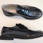 ANDREA MONTELPARE modello inglesina in pelle blu allacciata bambino