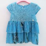 MISS BLUMARINE Top azzurro in plissé floreale