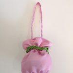 MIMISOL Borsa a secchiello tessuto rosa logata