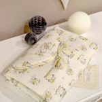 BLUMARINE BABY Fasciatoio da borsa con gufetti gialli